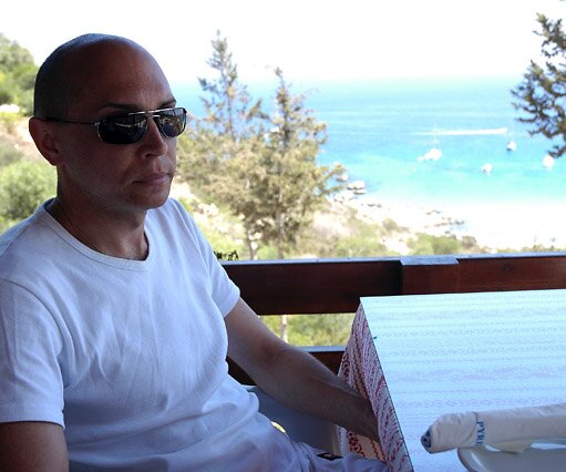 _DSC0177 Markos waiting for food, at a restaurant on the heights above Konnos bay
