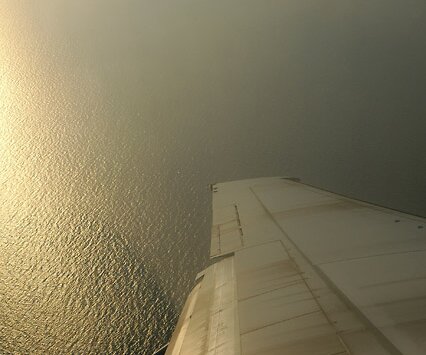 _DSC0022 Left turn towards Larnaca airport, afternoon sun reflecting in the sea.