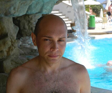 _DSC0179 Markos eating ice cream by the pool