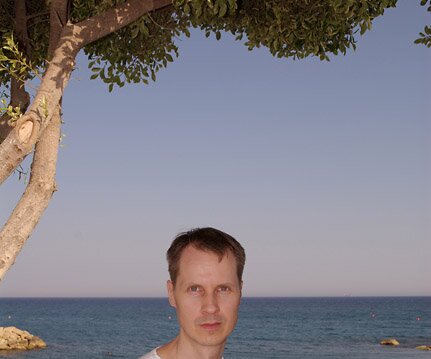 _DSC0004 Arto in the afternoon sun at Apollonia Beach Hotel in Limassol.