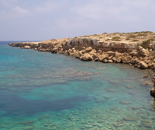 _DSC0053 At Cavo Greco, a fisherman to the right.