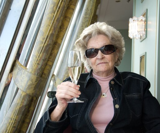 _DSC0007 Mum posing with a glass of champagne.