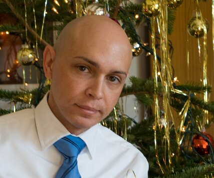 _DSC0014 Markos in front of the Christmas tree.