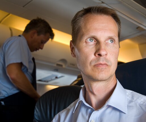 _DSC0031 Arto in the aircraft, going to Sweden.