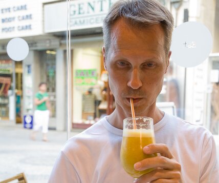 _DSC0015 Arto drinking a juice cocktail a hot day in Nicosia.