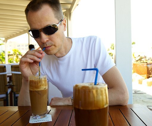 _DSC0055 Arto having frappé at the pool bar.