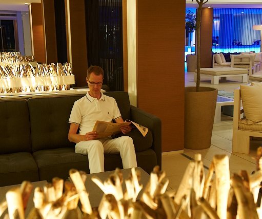 _DSC0025 Arto in the lobby at Capo Bay. The lobby bar in the background to the right.