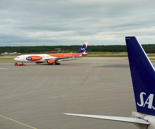 _DSC0002 View from the lounge at Arlanda airport. The Airbus being towed to the gate.