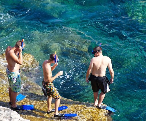 _DSC0025 Boys going snorkeling at the sea caves.