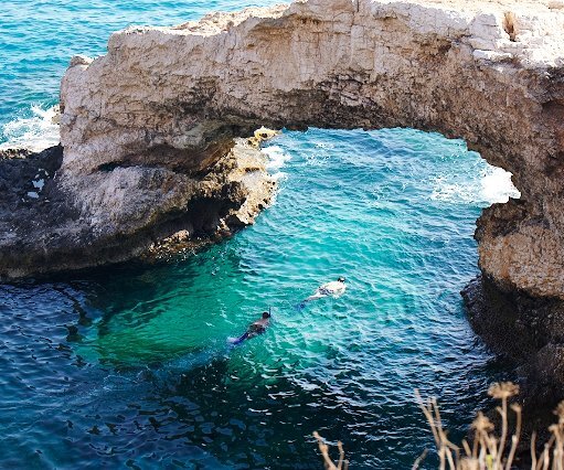 _DSC0030 Snorkeling under a natural bridge.