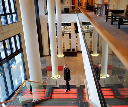 _DSC0052 Arto on the staircase in the lobby area.
