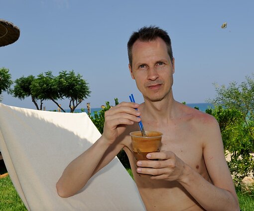 _DSC0040 Arto on the sunlounger having a frappé.