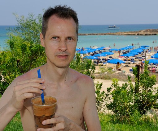 _DSC0043 Arto on the sunlounger having a frappé.