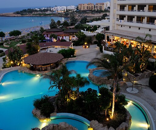 _DSC0042 View over the pool area and the sea at Capo Bay in the evening.