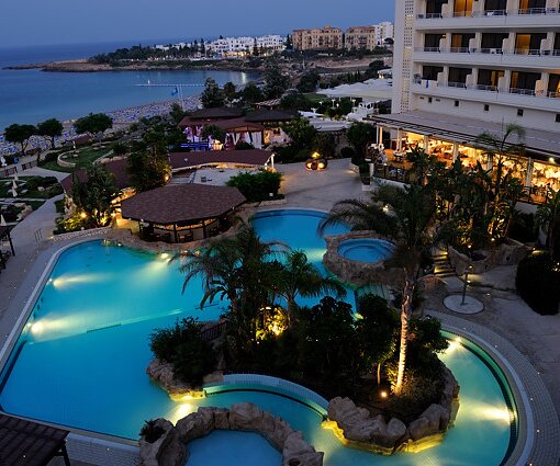 _DSC0045 View over the pool area and the sea at Capo Bay in the evening.