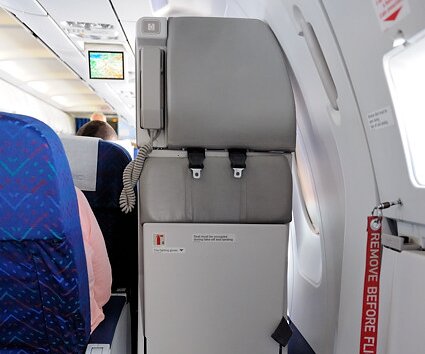 _DSC0038 By the exit, seat of cabin crew.