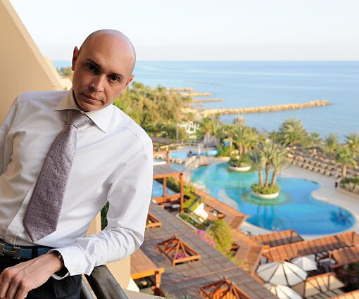 _DSC0077 Markos on the balcony at Four Seasons Hotel.