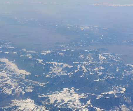 _DSC0006 Flying over snowy mountains.