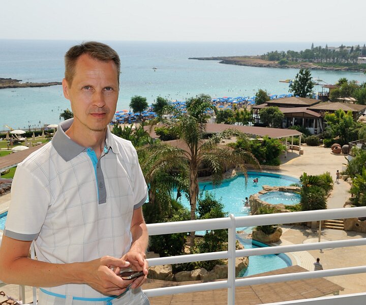 _DSC0001 Arto on the balcony of the hotel room.