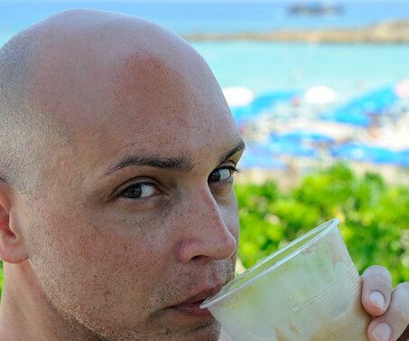 _DSC0013 Markos drinking an ice cold frappé.
