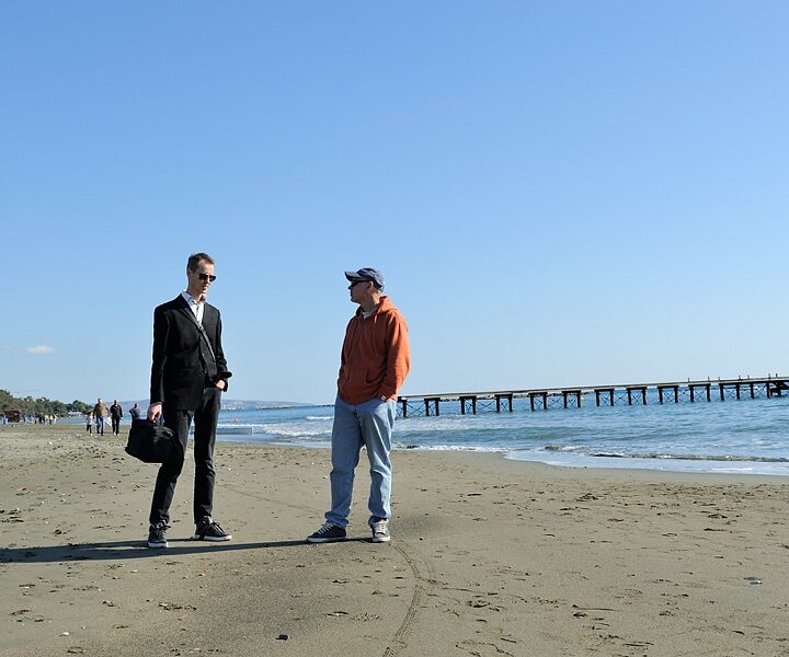 _DSC0051_1 Arto and Nicos walking along the beach.