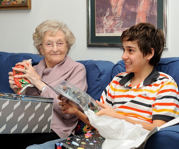 _DSC0044 Mum and Andreas inspecting their Christmas presents.