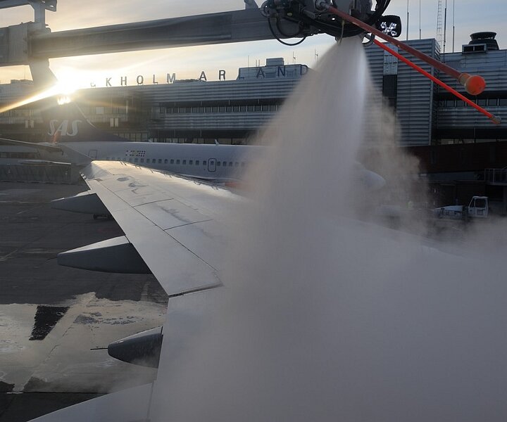 _DSC0001 Deicing of the aircraft on the early morning flight.