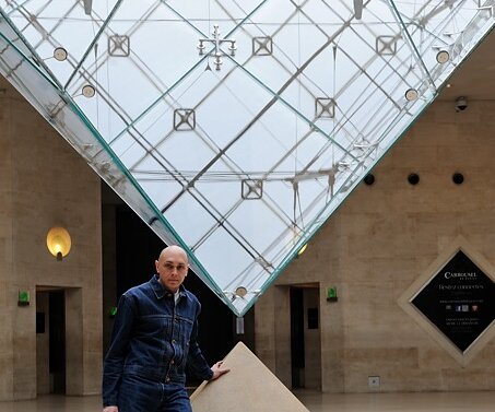 _DSC0032 Markos at the inverted glass pyramid at the Louvre.