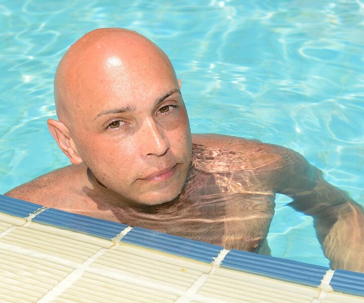 _DSC0033 Markos in the pool at Capo Bay hotel .