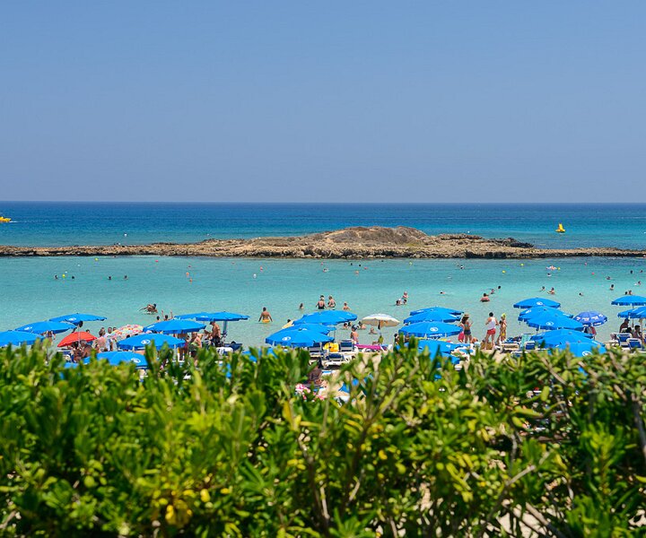 _DSC0019 View of the small island at Fig Tree Bay from the sunlounger at Capo Bay Hotel .