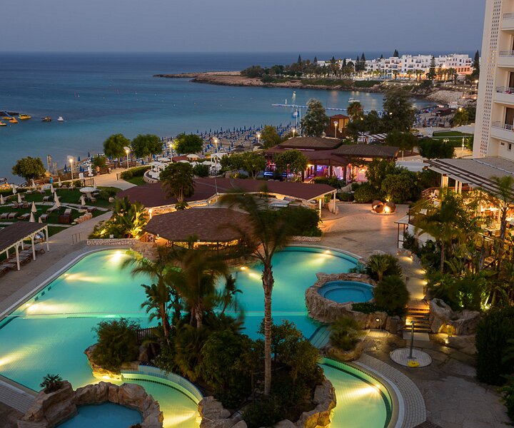 _DSC0006 View over Fig Tree Bay and the pool in the evening, from the room at Capo Bay Hotel .