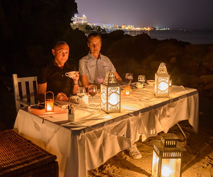_DSC0069 Markos and Arto having dinner on the beach.