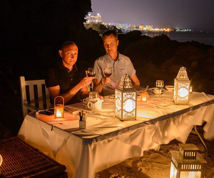 _DSC0070 Markos and Arto having dinner on the beach.