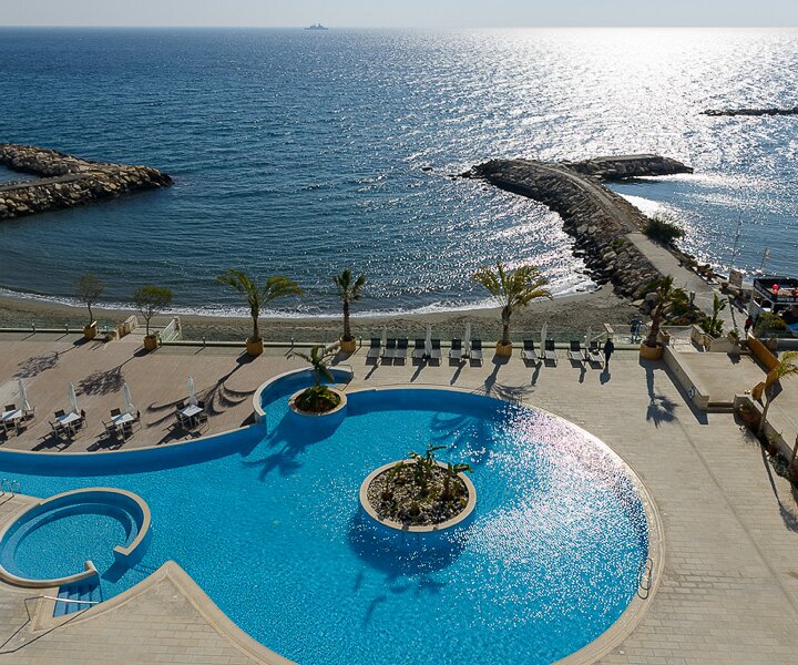 _DSC0020 The pool area and the beach at the Royal Apollonia hotel in Limassol.