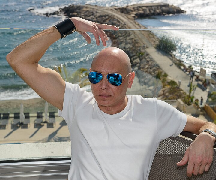 _DSC0024 Markos on the balcony of the room at the Royal Apollonia hotel.