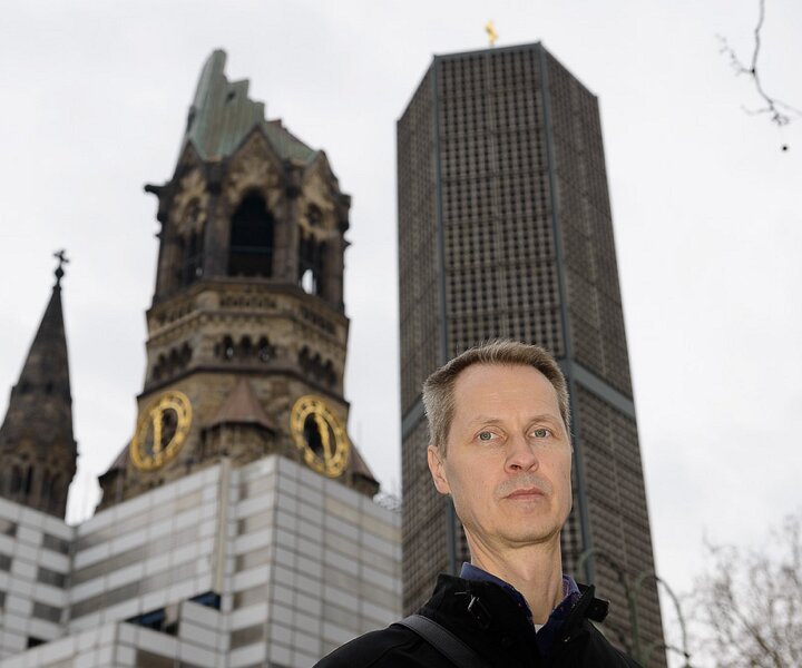 _DSC0013 Arto in front of the Kaiser Wilhelm Memorial Church (Gedächtniskirche) on the Kurfürstendamm in Berlin.