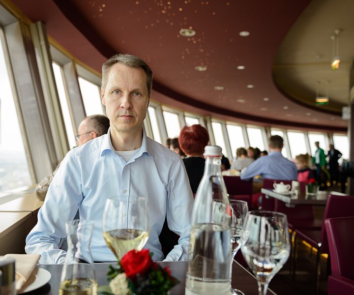 _DSC0043 Arto in the Sphere restaurant in the TV-tower at Alexanderplatz. At a hight of 207 meters.