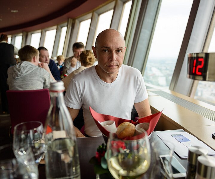 _DSC0045 Markos in the Sphere restaurant in the TV-tower at Alexanderplatz. At a hight of 207 meters.