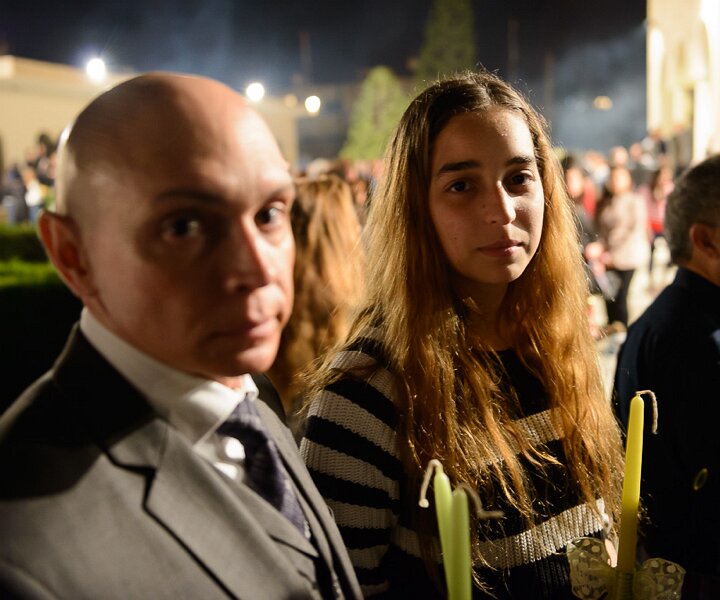 _DSC0051 Markos and Ingrid at church in Limassol at the night of Holy Saturday.