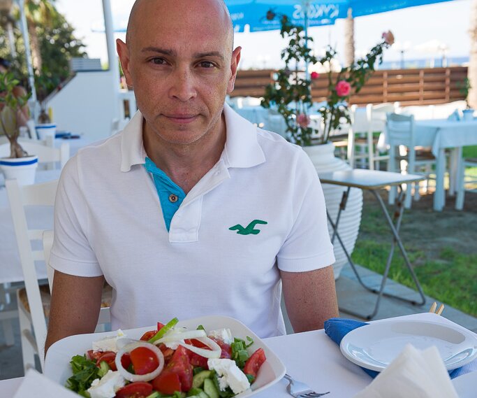 _DSC0008 Markos having lunch at a restaurant by Fig Tree Bay.