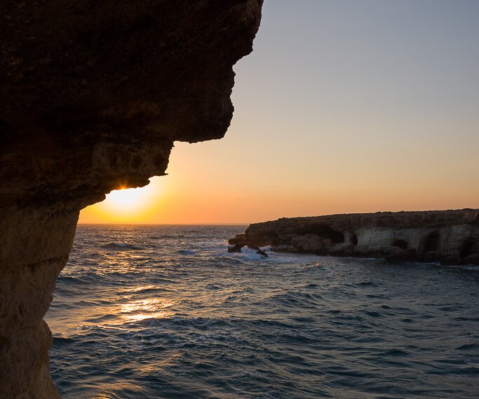 _DSC0066 Sunset from the sea caves at Cavo Greco.