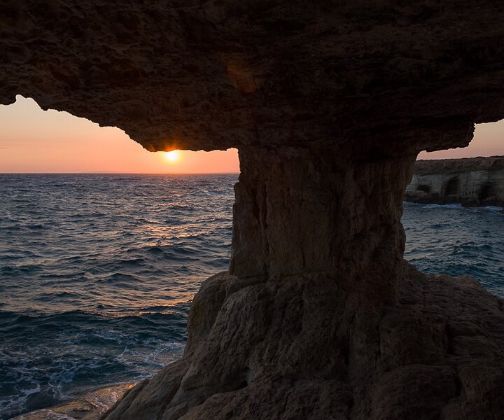 _DSC0084 Sunset from the sea caves at Cavo Greco.