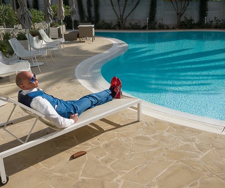 _DSC0016 Markos relaxing by the pool at Alasia Boutique Hotel on New Year's Eve.
