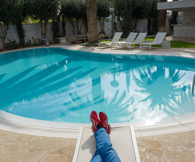 _DSC0020 Markos relaxing by the pool at Alasia Boutique Hotel on New Year's Eve.
