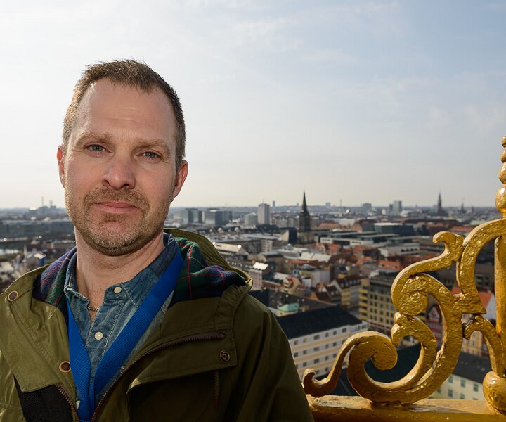 _DSC0011 Mikael at the spire of Vor Frelsers Kirke (Church of Our Saviour) in Copenhagen.