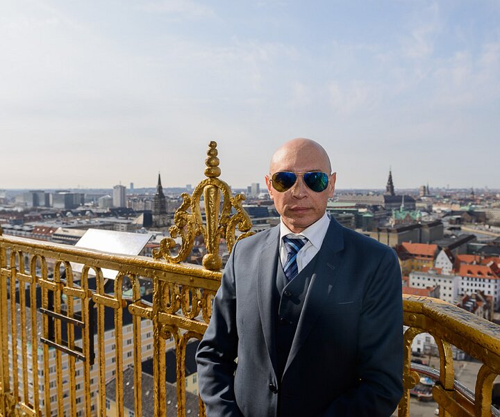 _DSC0023 Markos at the spire of Vor Frelsers Kirke (Church of Our Saviour) in Copenhagen.