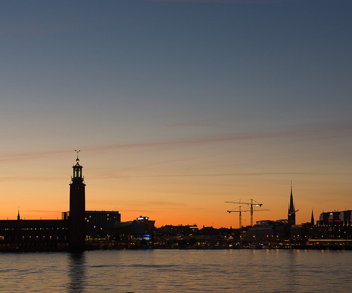 _DSC0040 View of Stockholm city at dusk, late evening in July. The city hall to the left.