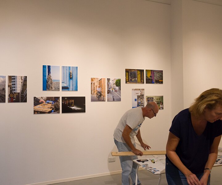 _DSC1769 Nicos and Anna preparing their photo exhibition.