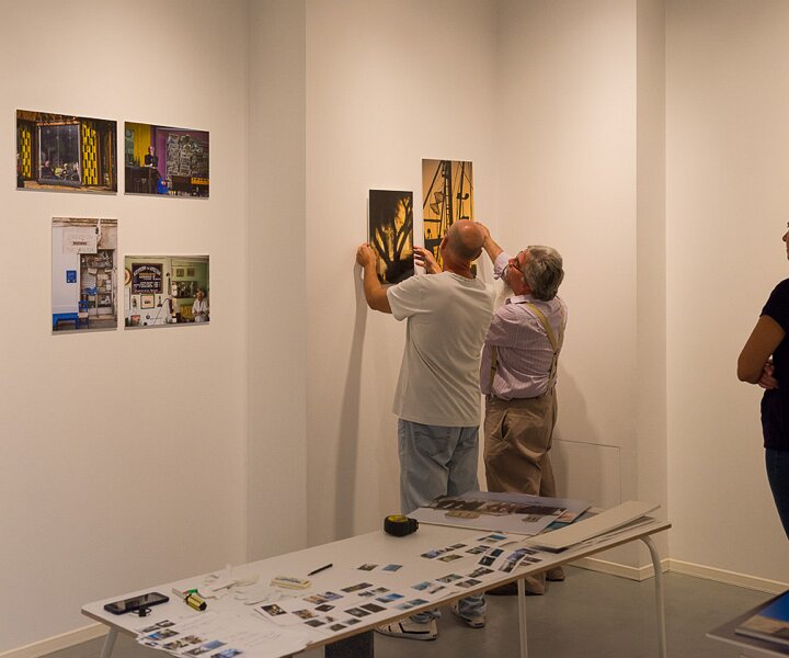 _DSC1772 Setting up photos for the photo exhibition.