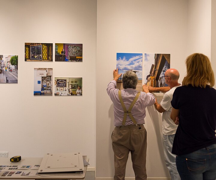 _DSC1780 Setting up photos for the photo exhibition.